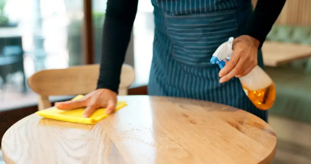 waiter-hands-and-cleaning-table-in-cafe-for-dust-2023-11-27-05-01-48-utc (1)